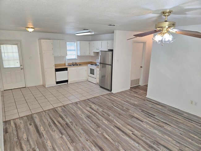 UNIT E, kitchen and living area - 605 College St