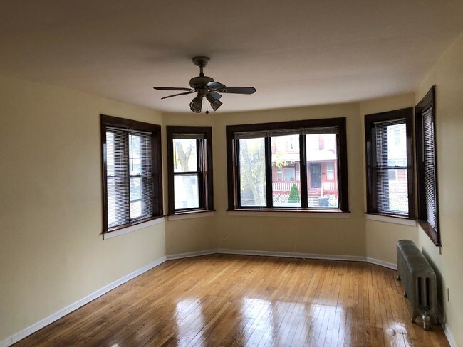 Building Photo - 7655-7657 S Coles Ave