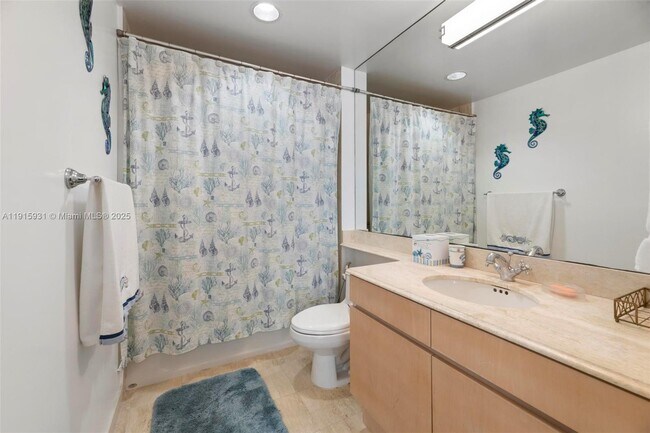 Building Photo - 18671 Collins Ave