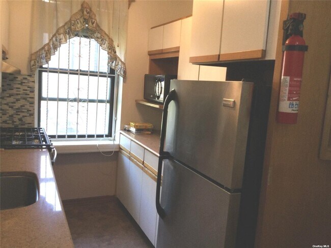 Building Photo - 19-62-62 80th St