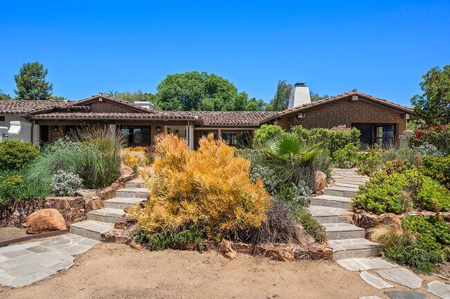 Building Photo - This Beautiful Hacienda Style Home combine...