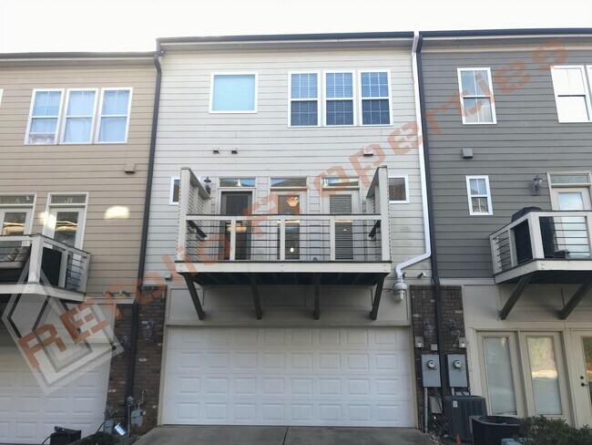 Building Photo - Elegant 3 Story 3 Bedroom Formal Model Tow...