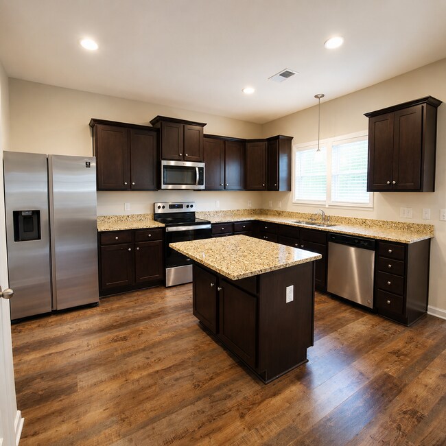 Building Photo - 4BR Home with Community Pool & Modern Finishes!