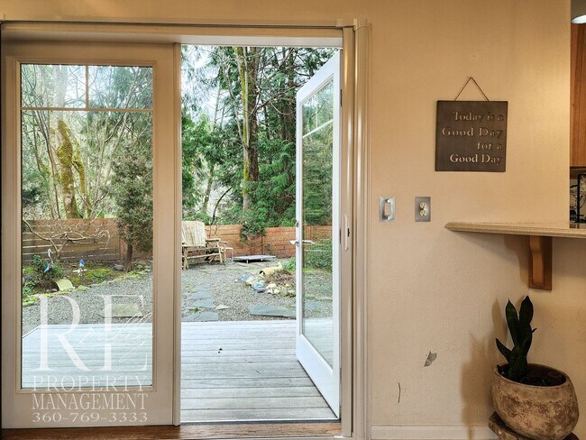 Building Photo - Light-Filled View Home with Vaulted Ceilings & Warm Wood Finishes