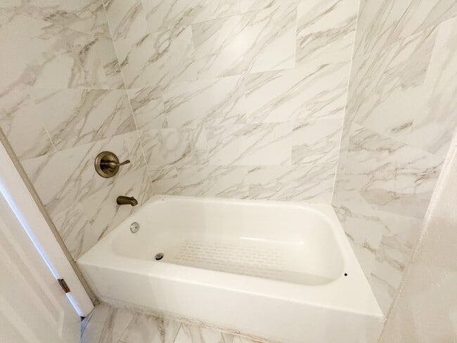 Building Photo - Updated 3 bedroom 2 bath! Lots of yard space for parking