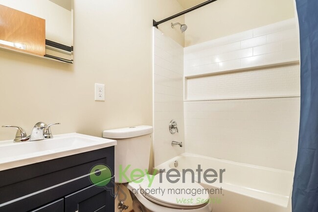 Building Photo - Bright 2-Bedroom with Garage, Storage, and...