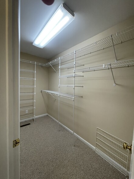 Walk-in closet in master bedroom - 8205 Ainsworth Dr