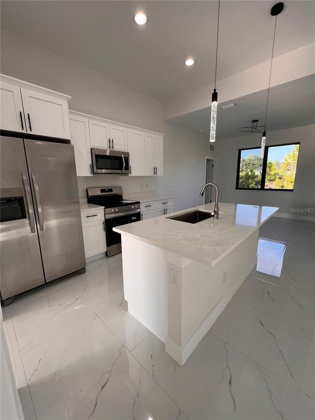 Building Photo - Be the first in occupy this 2025 constructed home in the vibrant city of Port Charlotte, FL! Qual...