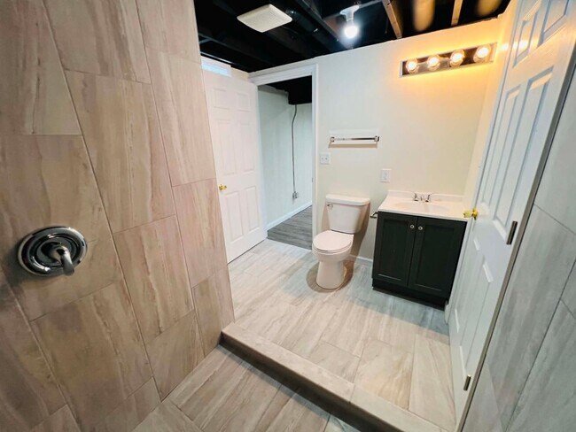 Building Photo - Spacious 4-Bedroom Home with Finished Basement & Attached Garage