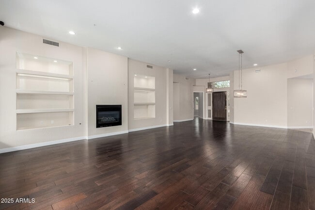 Building Photo - 8317 E Feathersong Ln