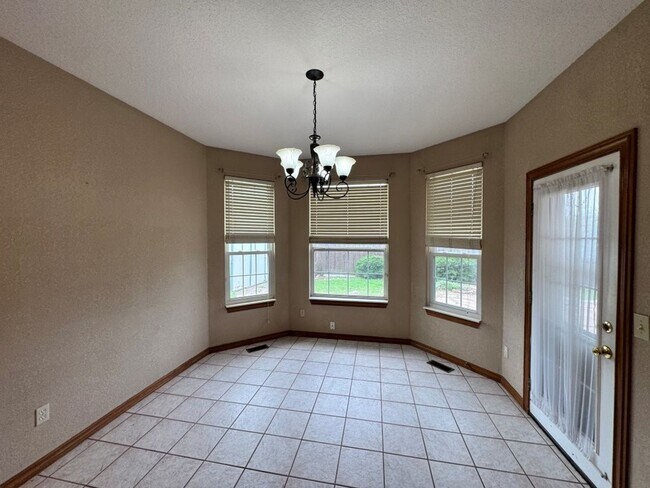 Building Photo - 4-bedroom 2 bath home in Kingsbrook, lots of storage, 2 dining areas and stand-up storm shelter! ...