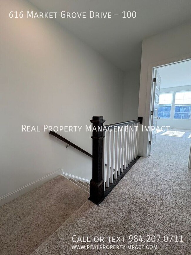 Building Photo - 616 Market Grove Drive-100