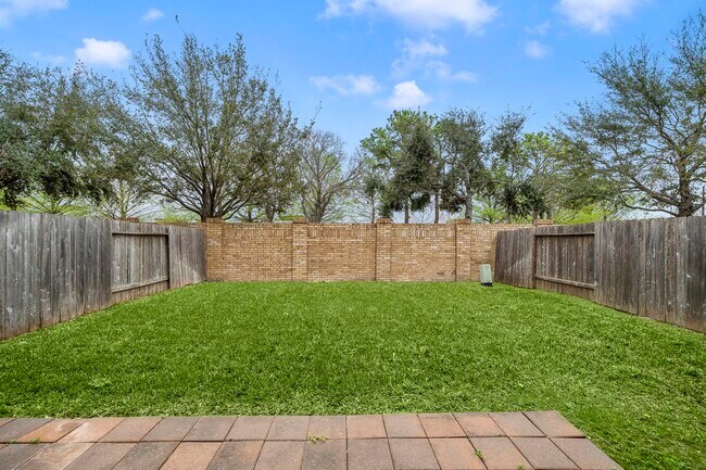 Building Photo - 9910 Spring Shadows Park Cir