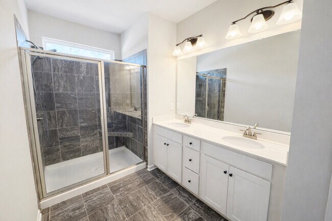 Building Photo - 3-bedroom Townhome in Buford City Schools with Quartz Kitchen, Private Suite, and Walkable Downto...