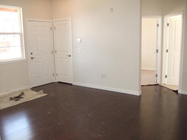 Building Photo - "Spacious 3-Bedroom Denver Condo with Cozy Fireplace & Modern Comforts!"