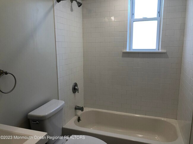 Building Photo - 320 8th Ave