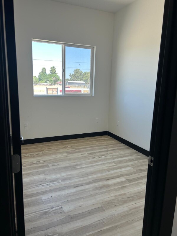 Building Photo - 9208 E Ave T 6