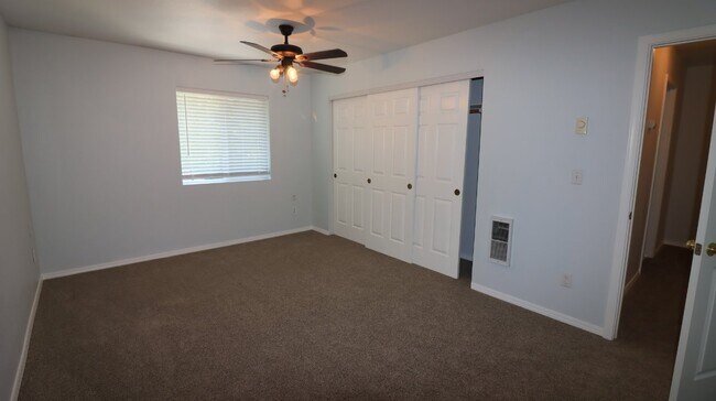 Building Photo - Recently updated 2/1.5 townhome next to th...