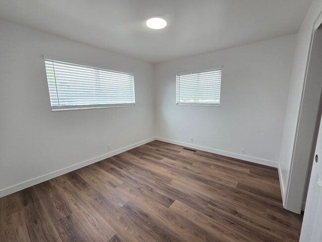 Building Photo - Remodeled 4 Bed, 2 Bath with Double Kitchen & Covered Carport