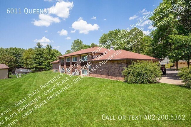 Building Photo - 6011 Queens Dr
