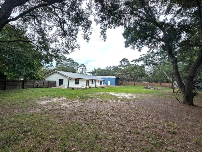 Building Photo - 8717 Sand Pine Dr