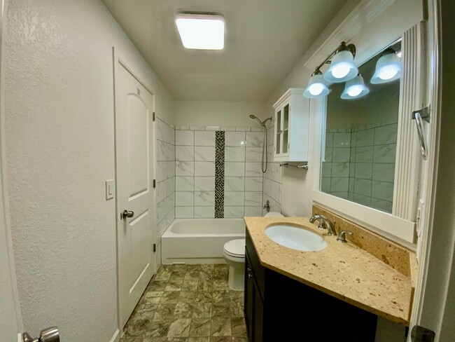 Building Photo - 2-Bedroom, 2-Bathroom End Unit with Covered Balcony