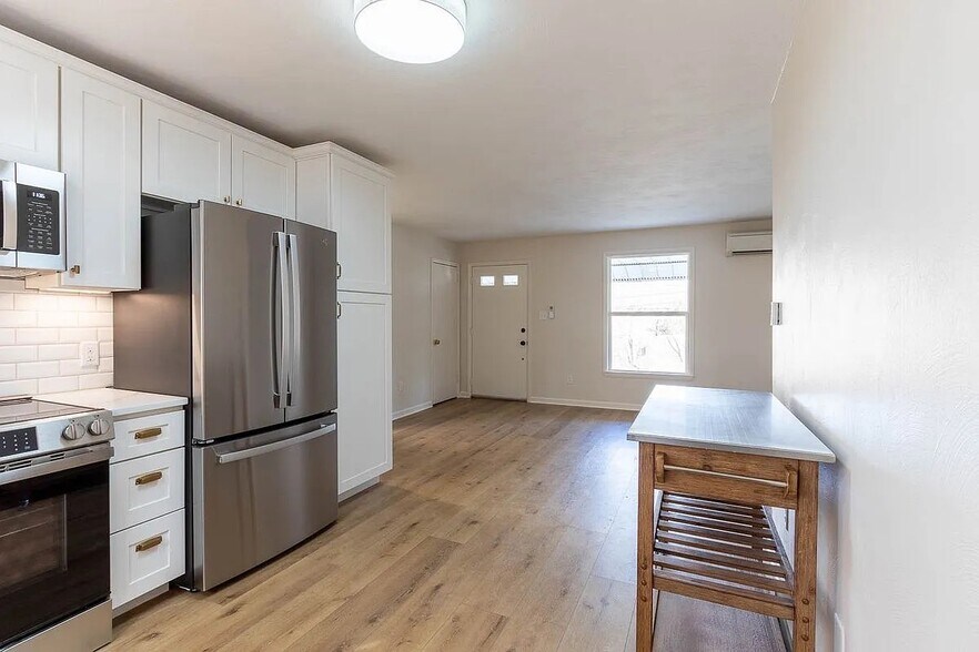 view from kitchen into living room - 1026 N Atherton St