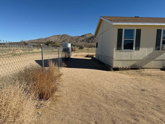 Building Photo - New Year Special! 50% Off First Month's Rent!