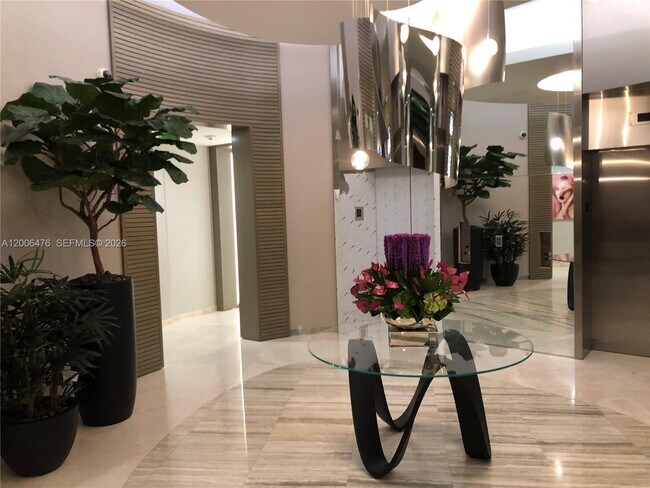 Building Photo - 10275 Collins Ave