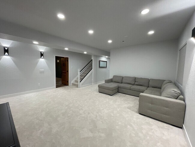 Building Photo - Live Lavishly in Harmony Ridge- Fully Furnished 5-Bedroom Dream Home with Backyard Oasis & Speake...