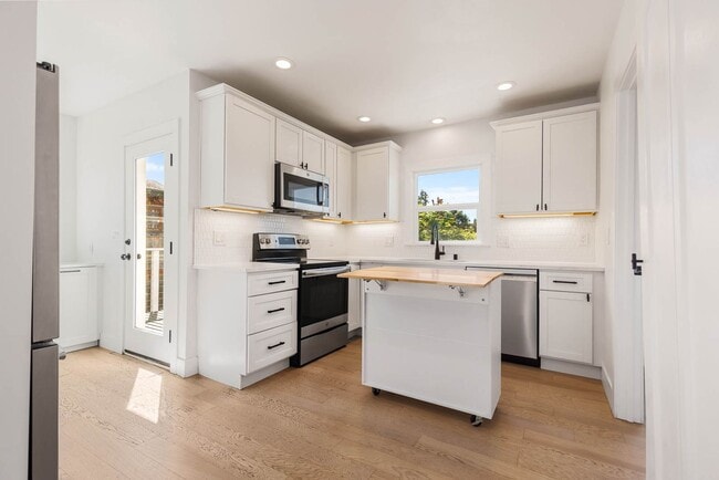 Building Photo - 4 Bedroom West Seattle View Retreat | Fully Remodeled Home with Sound Views & RV Parking