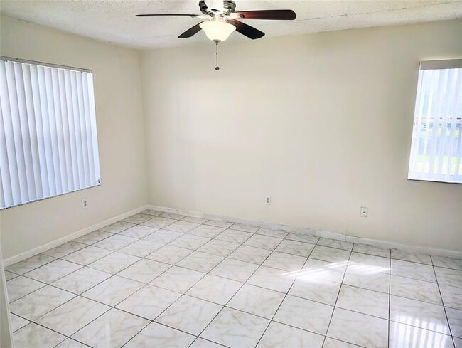 Building Photo - 5590 NW 61st St