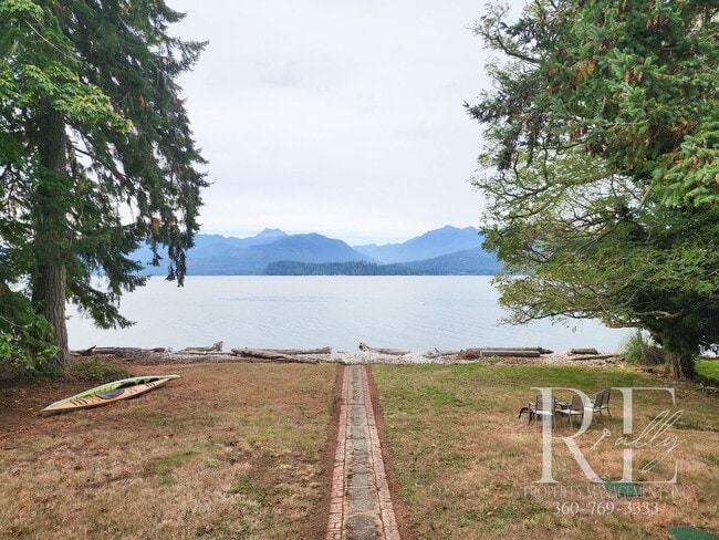 Building Photo - Waterfront Tudor | Private, Vintage Charm with Casita