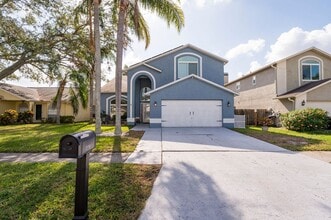 Building Photo - STUNNING 4-BED, 3-BATH HOME WITH SOLAR PANELS IN TAMPA, FL!