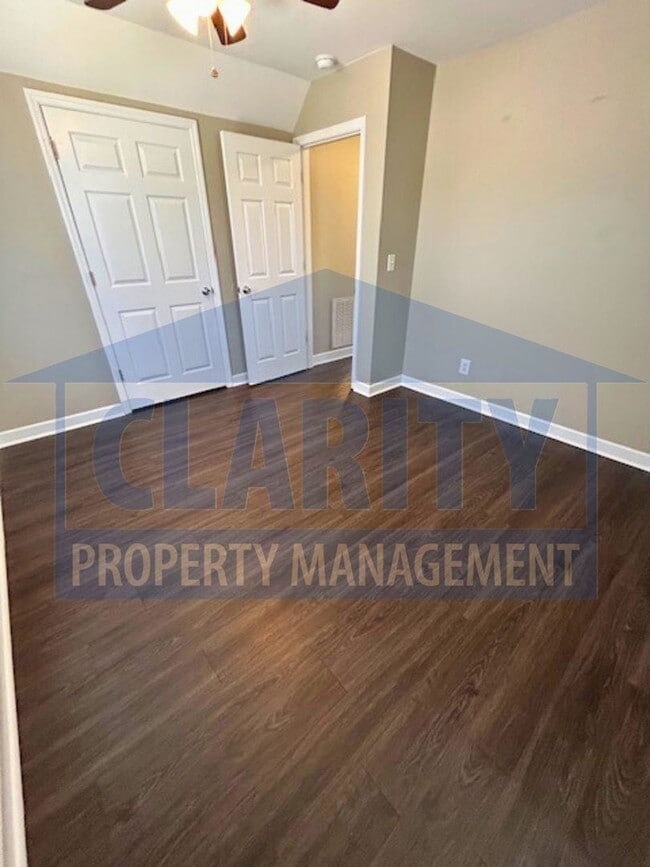 Building Photo - Charming three-bedroom home with carport!