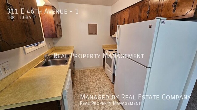 Building Photo - 311 E 46th Ave