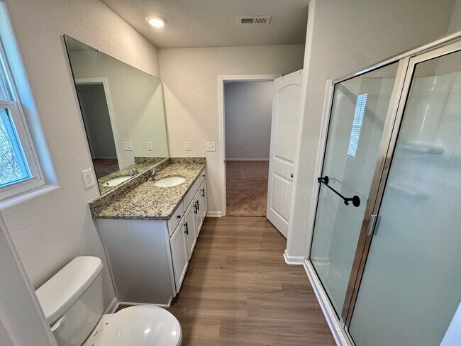 Building Photo - Located in Creedmore Hills a 4BR/2.5BA home with 2 car garage