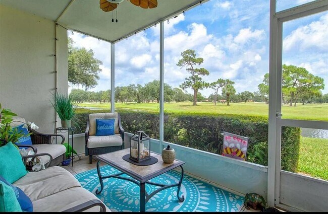 Building Photo - Annual OR Seasonal turnkey FURNISHED 2/2 ground floor condo with golf course and water views