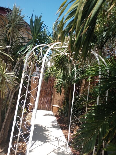 2nd gate on side leads back to backyard/your Tiny Unit. - 281 Kaikea St