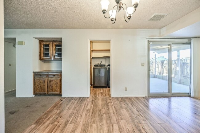 Building Photo - 3 bedroom, 2 bath with large living room and brick fireplace.  Good size kitchen with tons of cab...