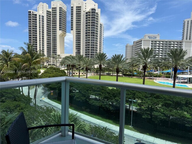 Building Photo - 19370 Collins Ave