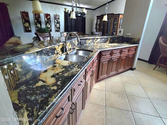 Building Photo - 6931 Cane Grass Ln E