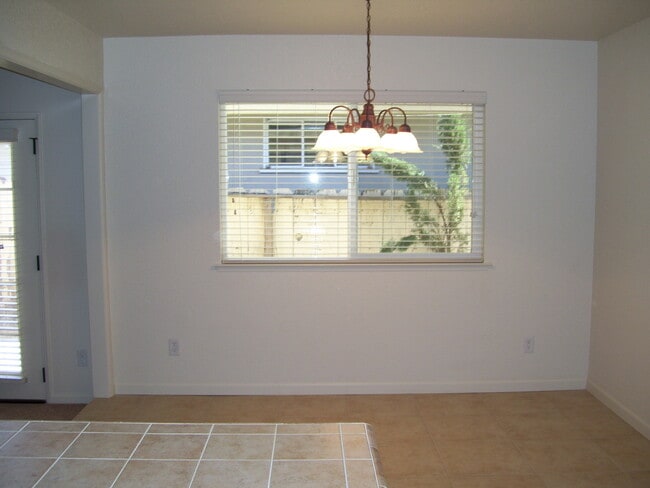 Building Photo - Recently remodeled home offering many upda...