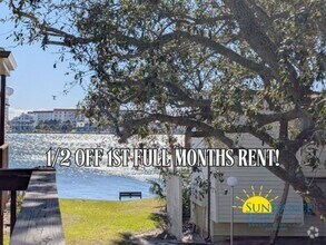 Building Photo - Expansive waterfront covered patio off thi...