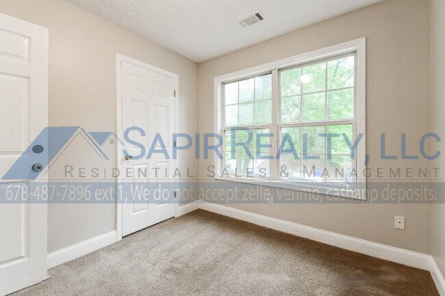 Building Photo - LIMITED-TIME OFFER! Apply today with NO APPLICATION FEE! Terms apply. Call (678) 487-7896, Option...