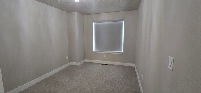 Building Photo - Come check out this beautiful 3 story town...