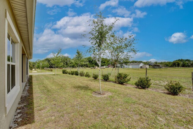 Building Photo - Move-In Ready 2BR/2BA Villa with Den + 2-Car Garage | Lake Nona Adjacent | Suncrest at St. Cloud