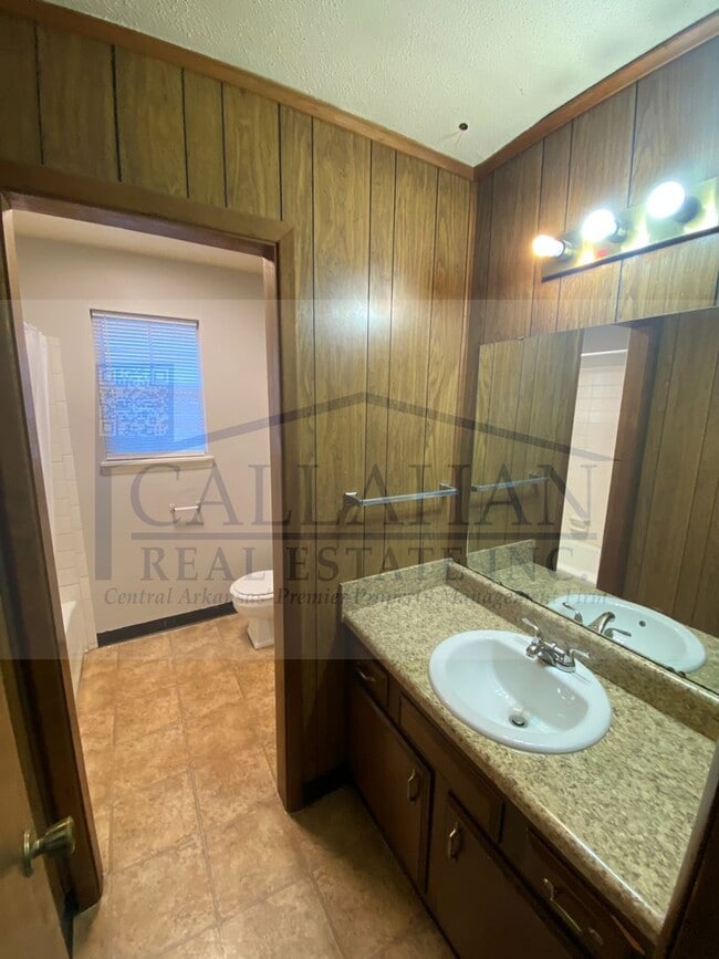 Building Photo - 8211 Woodview Dr N