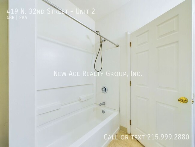 Building Photo - Spacious, Bi-level Apartment Available at ...