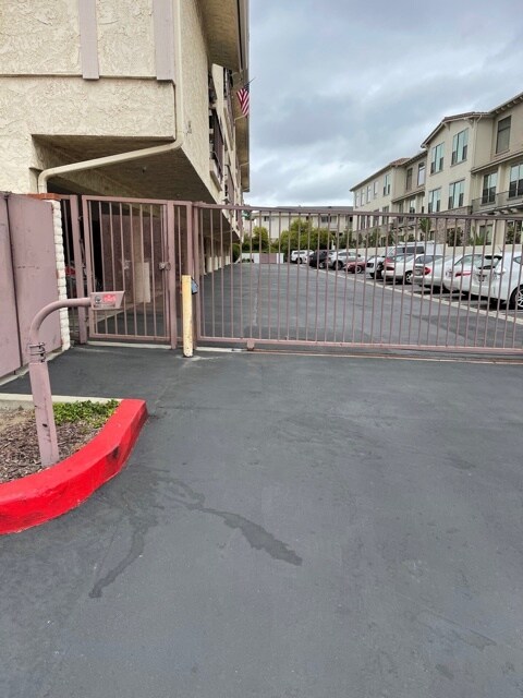 Secure gated carport entry - 18900 Delaware St